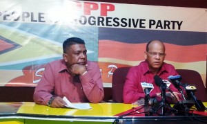 General Secretary of the PPP, Clement Rohee [right] and PPP member, Zulficar Mustapha. [iNews' Photo]