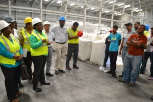 Broomes addressing a group of workers at the Enmore Packaging Plant