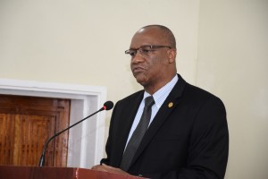 Minister of State, Joseph Harmon. 