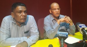 General Secretary of the PPP/C Clement Rohee [right) and Executive Secretary, Zulficar Mustapha during the press conference. [iNews' Photo]