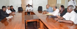 Finance Minister Winston Jordan [center) and his team, meeting with PPP’s officials for Annual Budget consultations 