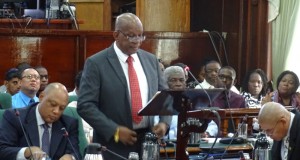 Minister of Finance, Winston Jordan presents the 2015 budget in the National Assembly. [iNews' Photo]